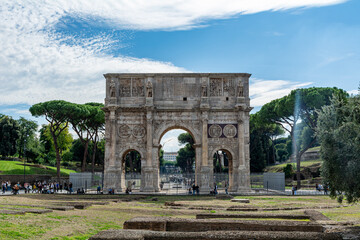 Fototapeta na wymiar The triumphal Arch of Constantine next to the Colosseum in Rome.