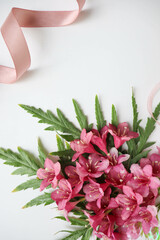 postcard layout. frame of pink flowers and space for text 