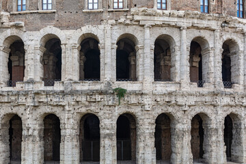 Obraz premium Ruins of the ancient Roman theater of Marcellus and the temple of Apollo Sosianus in Rome
