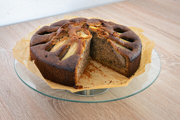 Fototapeta na wymiar Homemade cake made of pears and ground walnuts