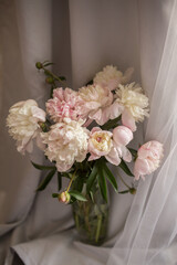 bouquet of pink and white peonies