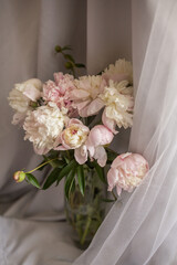 bouquet of pink and white peonies