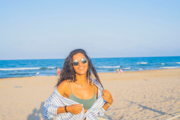 Young indian woman happy in the beach