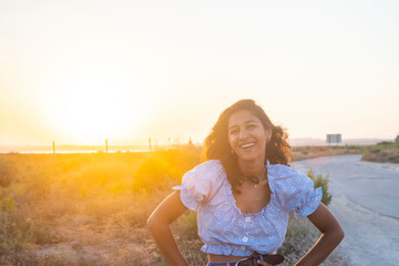 Young indian woman happy in the countryside