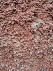wall covered with painted porous expanded clay close-up 