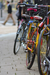 Fototapeta na wymiar Bikes parked on street fence