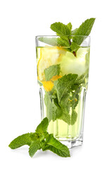 Glass of tasty mint tea with lemon on white background