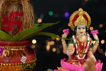 Beautiful Statue Of Maa Mata Lakshmi Laxmi Devi With Clay Kalash And Bokeh Effect. Theme For Diwali...