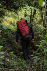 Old man climber on the mountain