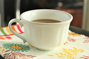  closeup cup of coffee with milk nobody towel hot drinks cappucino latte americano caffeine breakfast mug white
