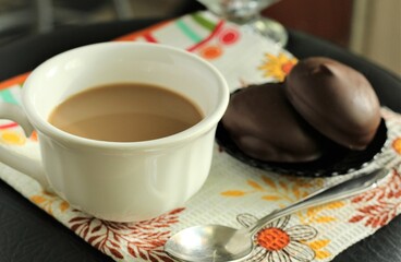 closeup cup of coffee with chocolate cookies spoon table eat dessert sweet sugar tasty food nobody towel milk hot drinks cappucino latte americano caffeine breakfast mug