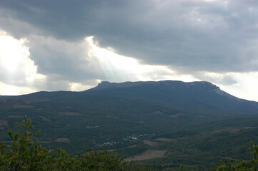 Naklejka premium clouds over the mountains