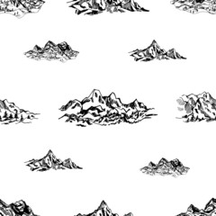 Seamless pattern of hand drawn sketch style mountains isolated on white background. Vector illustration.
