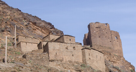 castle and village, in high atlas mountains morocco. the use of this kind of castle in the high mountains is to protect the goods of the villagers,