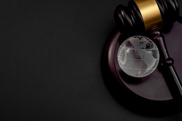 One world government, worldwide global legal system and international law concept with wooden judge...