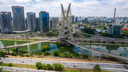 Fototapeta na wymiar Estaiada's bridge aerial view in Marginal Pinheiros, São Paulo, Brazil. Business center. Financial Center. Famous cable stayed (Ponte Estaiada) bridge