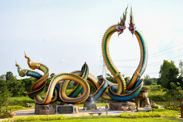 Twin Stucco painted as a large serpent at Pra kai keaw wang nakin, Located at Ban Don swan, Phen District, Udon Thani, Thailand.