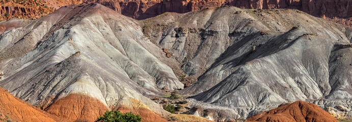 Panoramic view of grey sedimentary rock formations near Capito reef national park in Utah