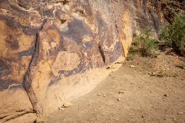 Sandstone Rock Wall With Petroglyphs in Price, Utah