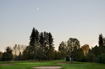 Moon Rising of Golf Green in the Forest
