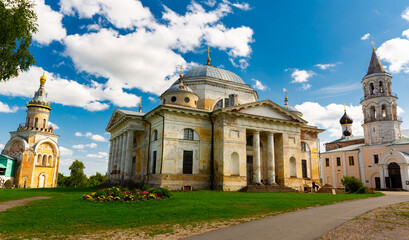 View of inner court and architectural ensemble of ancient Novotorzhsky Borisoglebsky Monastery in Russian town of Torzhok on sunny summer day, Tver region
