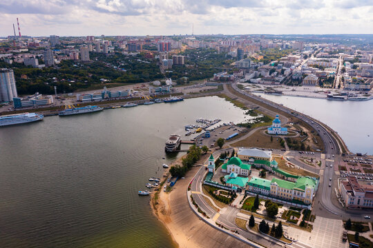 Cityscape of Cheboksary with view of river port and Holy Trinity Orthodox Monastery.