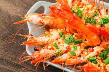 A plate of steamed shrimps with garlic