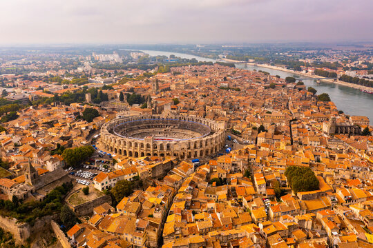 Panorama of ancient town Arles with old roman arena in Provence and Cote d'Azur, France