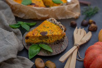 home made pumpkin quiche lorraine on a table