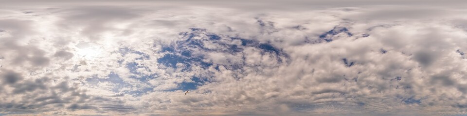 Obraz premium Blue sky panorama with Cumulus clouds. Seamless hdr 360 degree pano in spherical equirectangular format. Complete zenith for 3D visualization, game and sky replacement for aerial drone 360 panoramas.