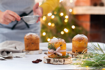 Traditional Italian Christmas cake Panettone with festive decorations 