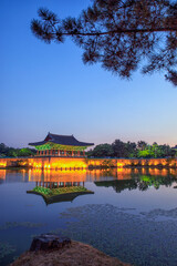The pavilions of Anapji Pond lit up as evening comes on in Gyeongju, South Korea