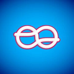 White Nautical rope knots icon isolated on blue background. Rope tied in a knot. Vector