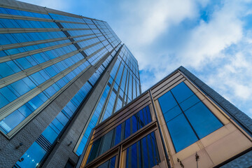 Obraz premium modern office building against blue sky