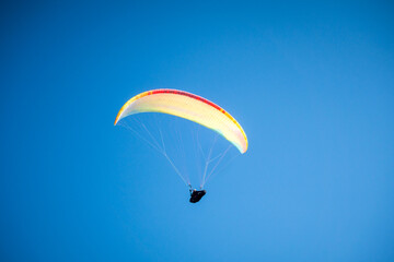 paragliding flight in the mountains. Le Grand-Bornand, France
