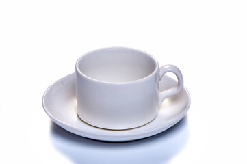 white coffee cup with saucer on white isolated background