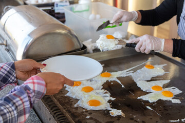 Fried eggs on the stove