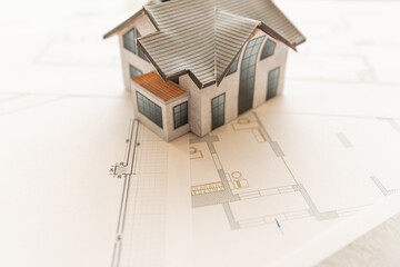 Design and construction of cottages. Layout and drawing of a country house. Architecture and construction. Layout of the house, boards. Private house.