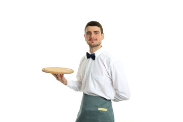 Young man waiter holds tray, isolated on white background