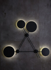 Close-up LED lamp on a concrete wall. LED lamp black background 