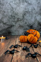 Fototapeta premium Background with pumpkins, candles and spiders