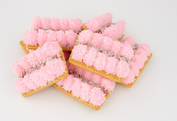 Group of jam mallows soft crumbly biscuits topped with pink mallow and raspberry flavour jam...