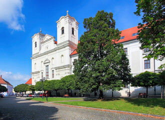 Fototapeta na wymiar Jesuit church in Skalica, Slovak republic. Religious architecture. Place of worship. Cultural heritage. Architectural scene.