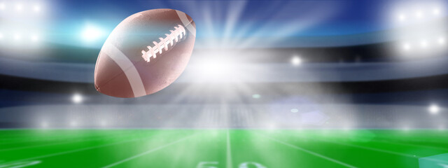 American Football ball on stadium background.