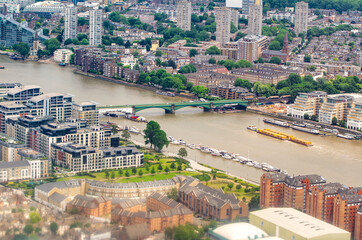 Fototapeta premium London aerial view from helicopter. River Thames and city skyline.