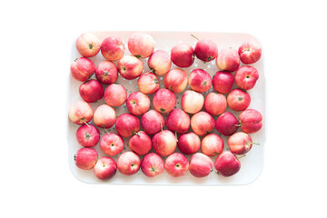 Harvested crop. Ripe red apples isolated on a white background.