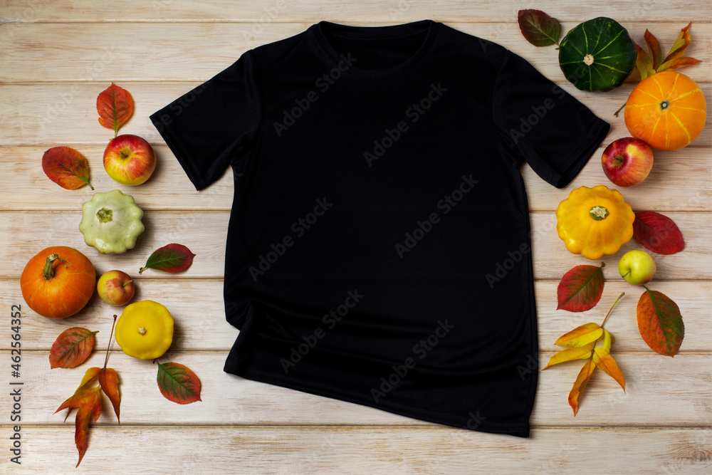 Wall mural Unisex black T-shirt mockup with fall decor