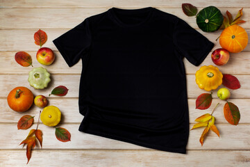 Unisex black T-shirt mockup with fall decor