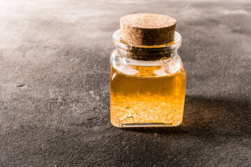 Dandelion flower syrup with sugar crystals