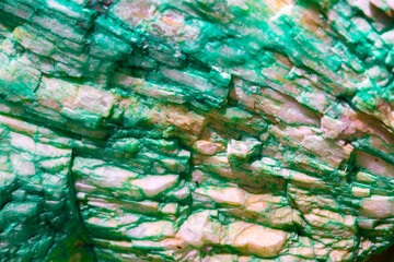 Background from dracocene crystals of stones. Fluorite stone in the rocks of the adit. Mineral stones in their natural environment. Semiprecious stones texture.